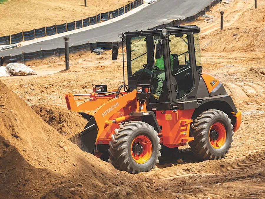 hitachi compact wheel loader zw80-5b moving dirt