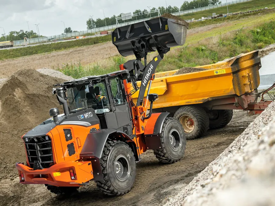 zw160-7 hitachi landcross wheel loader moving dirt